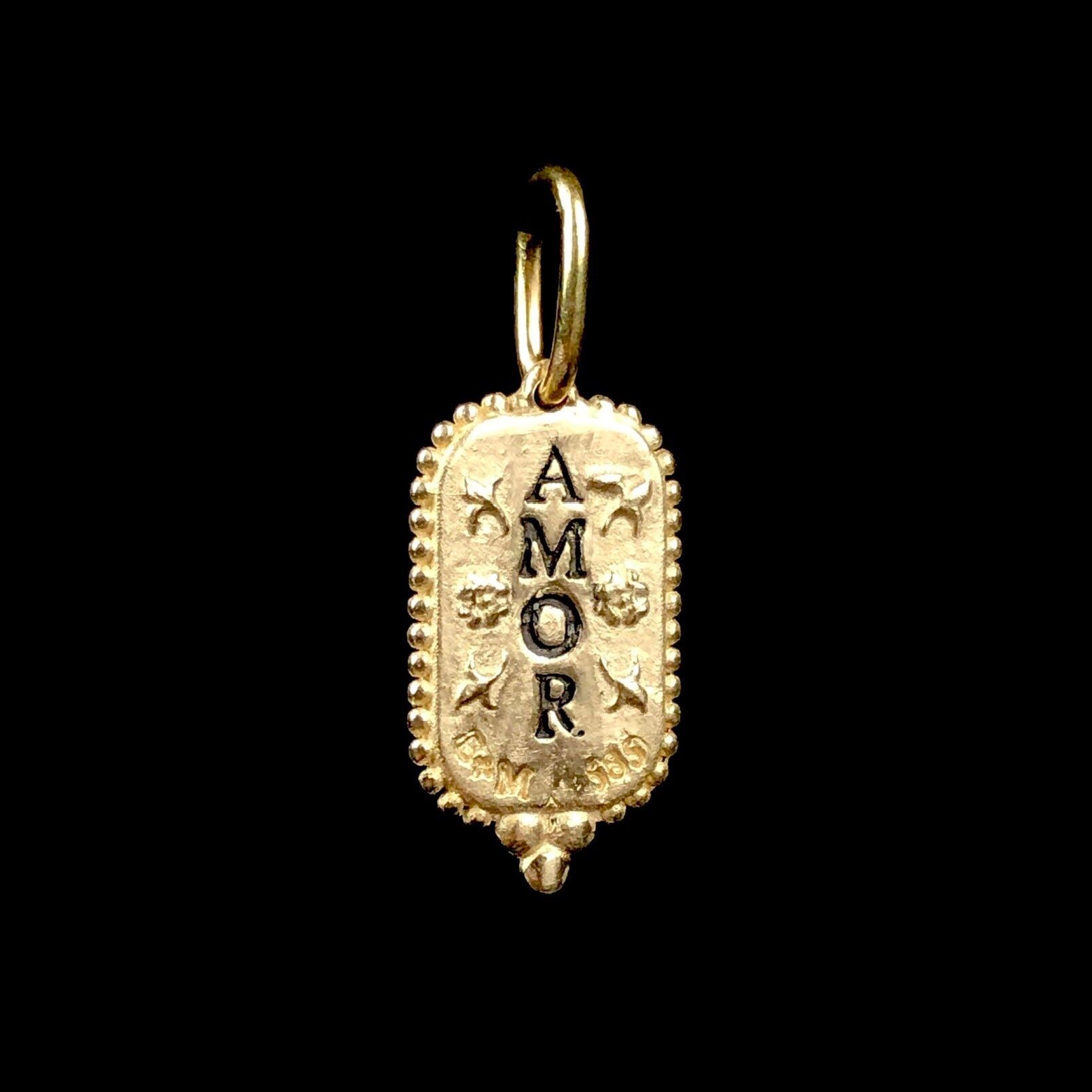 Back side of Gold Bee Charm with the word AMOR from top to bottom