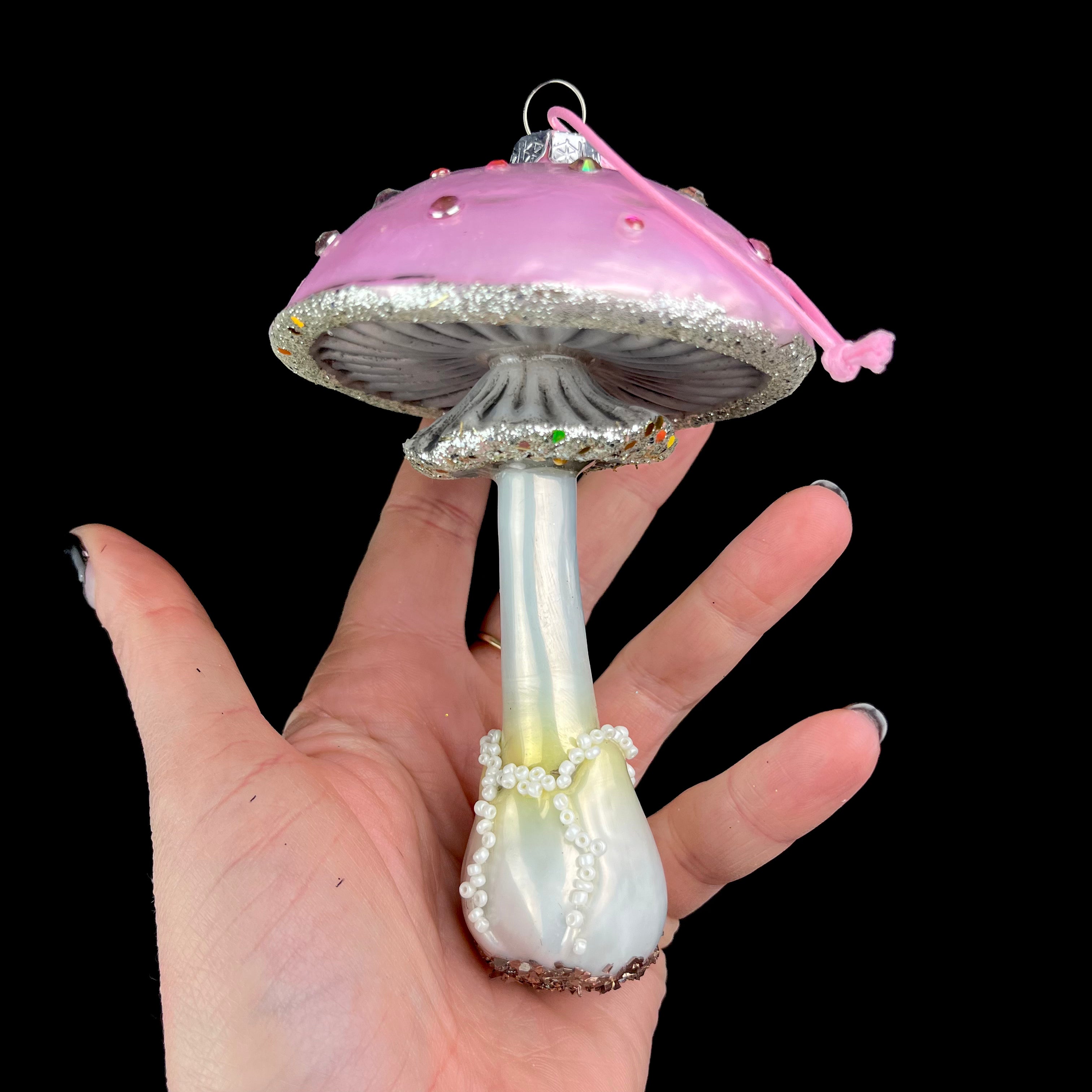 Pink Mushroom Ornament in hand