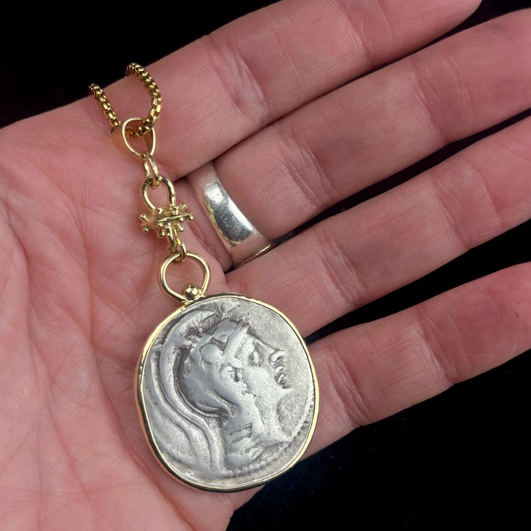 Athena Parthenos Coin shown in hand