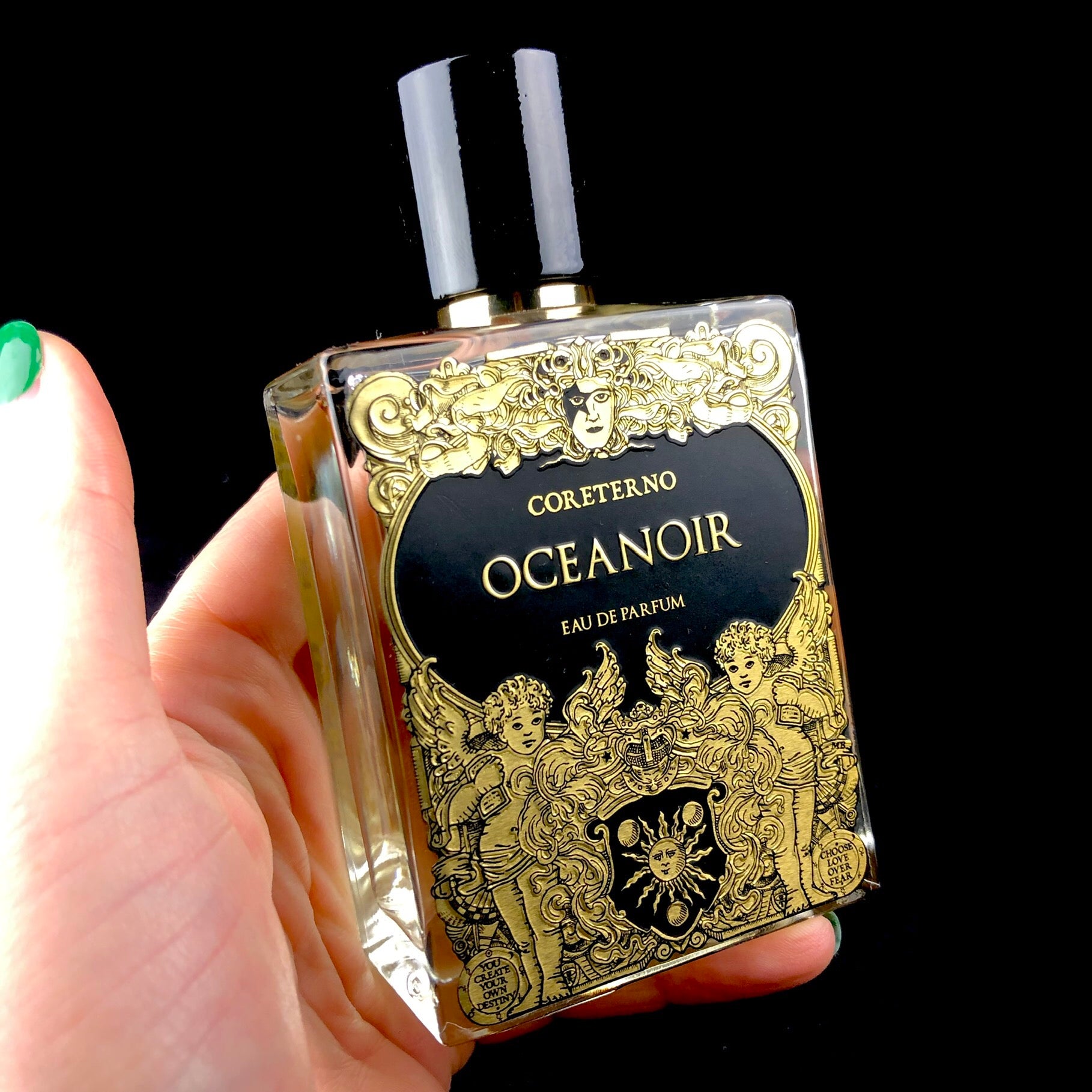 Bottle of Oceanoir parfum shown in hand