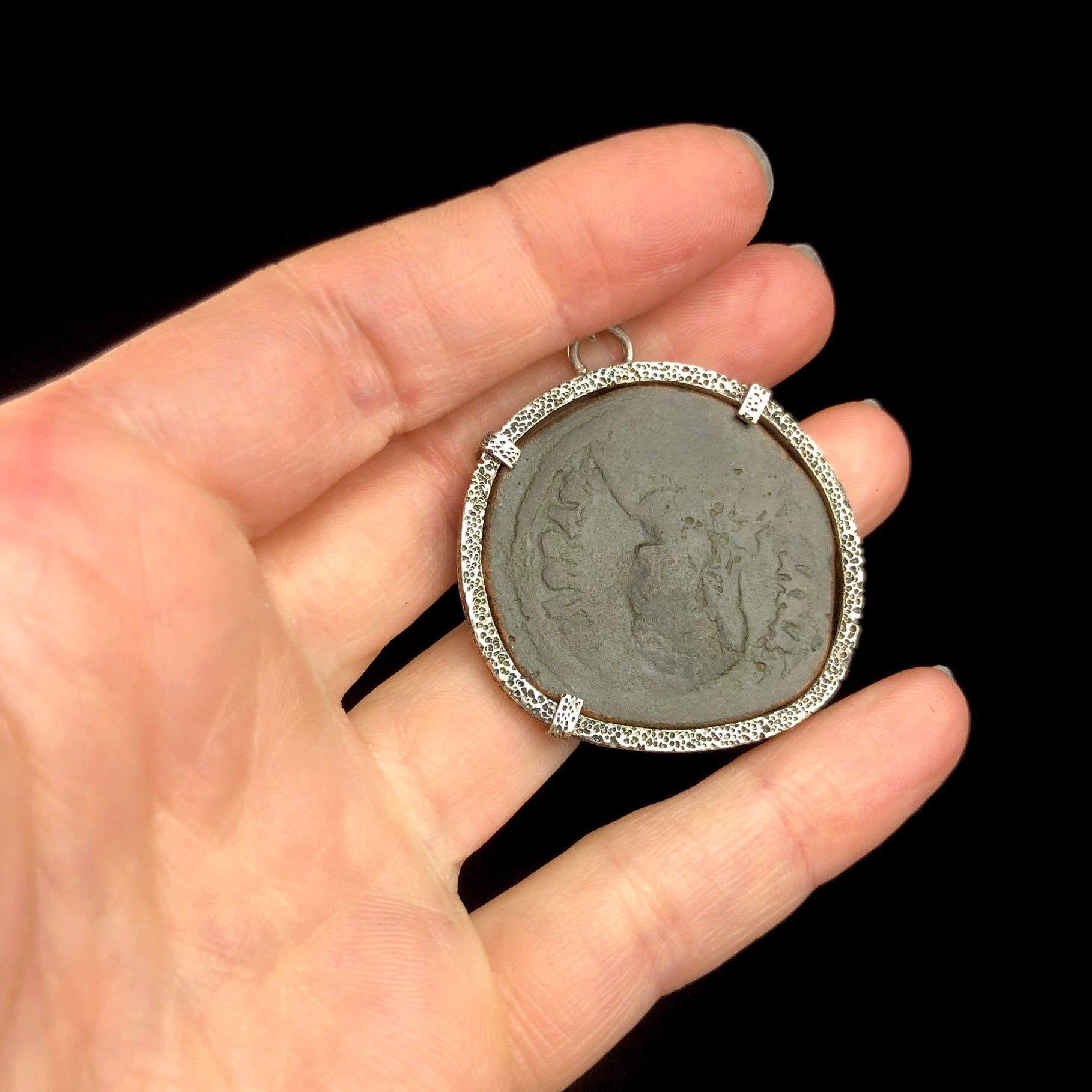 Back view of Byzantine Coin Silver Pendent with worn figure shown upsidedown