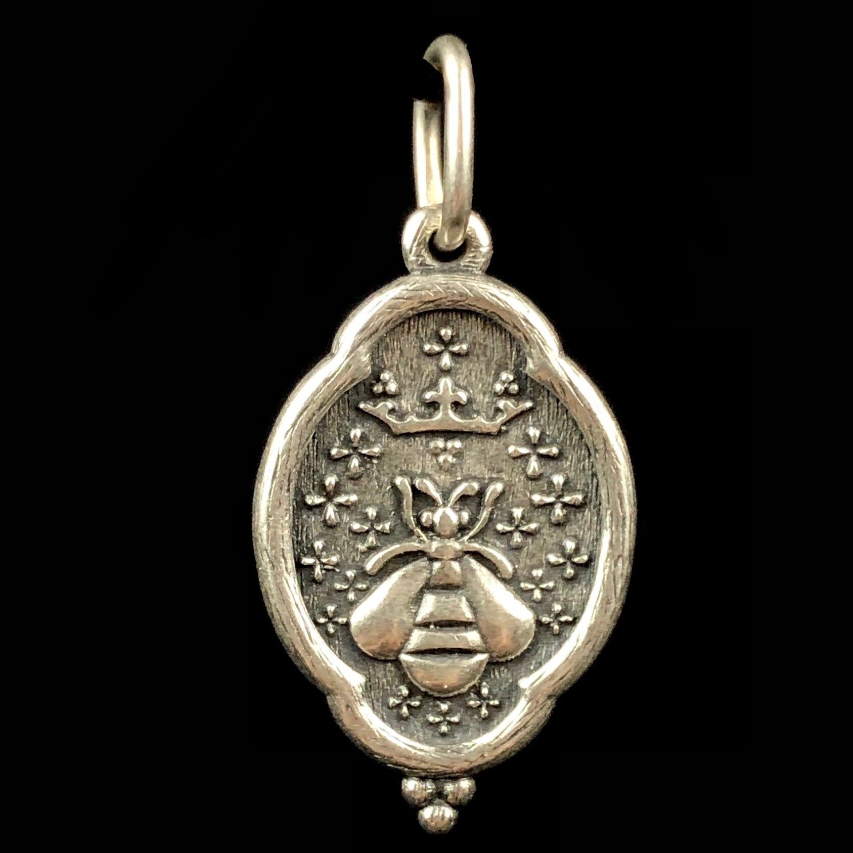 Front side of Queen Bee Silver Charm