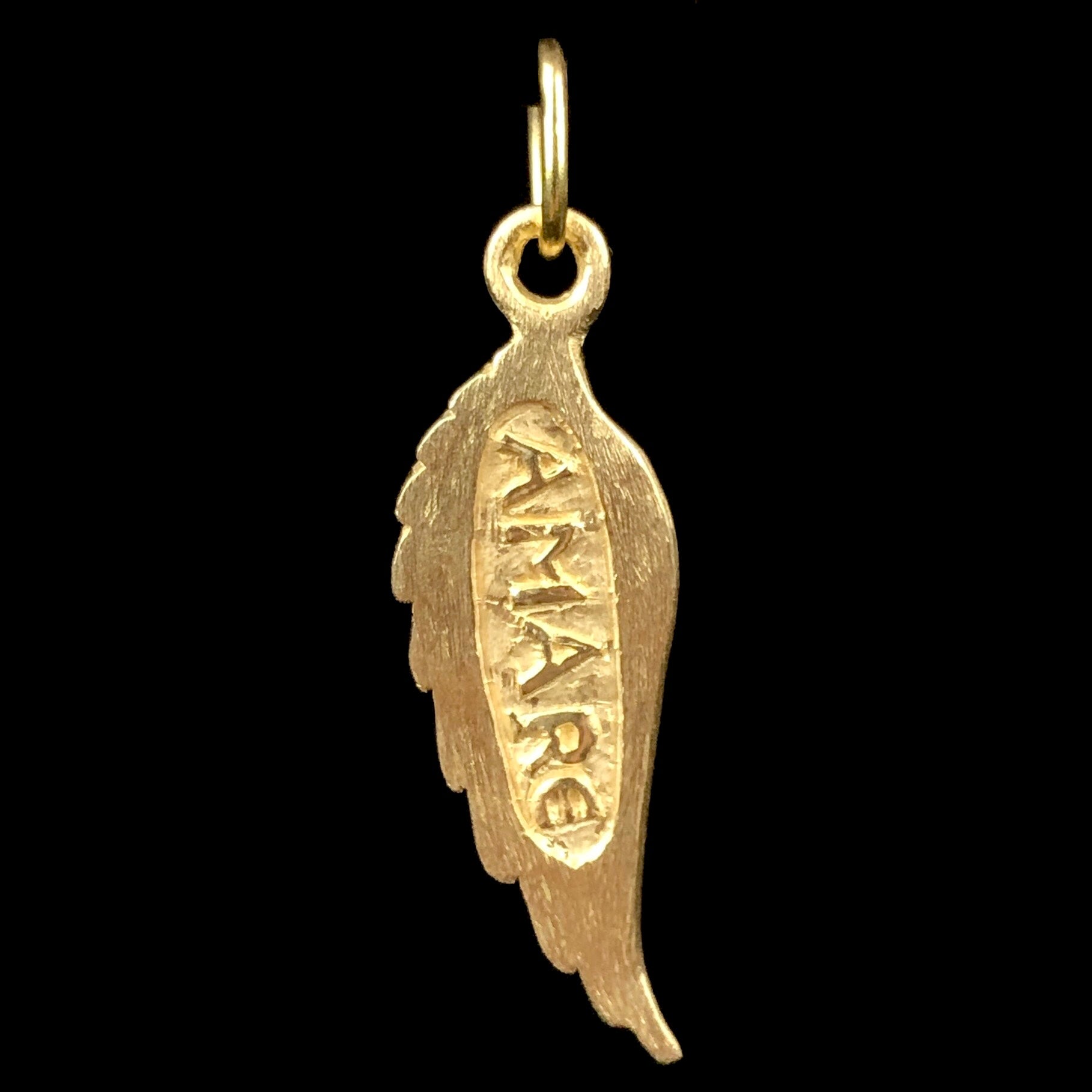 Back side of Gold & Diamond Wing Charm