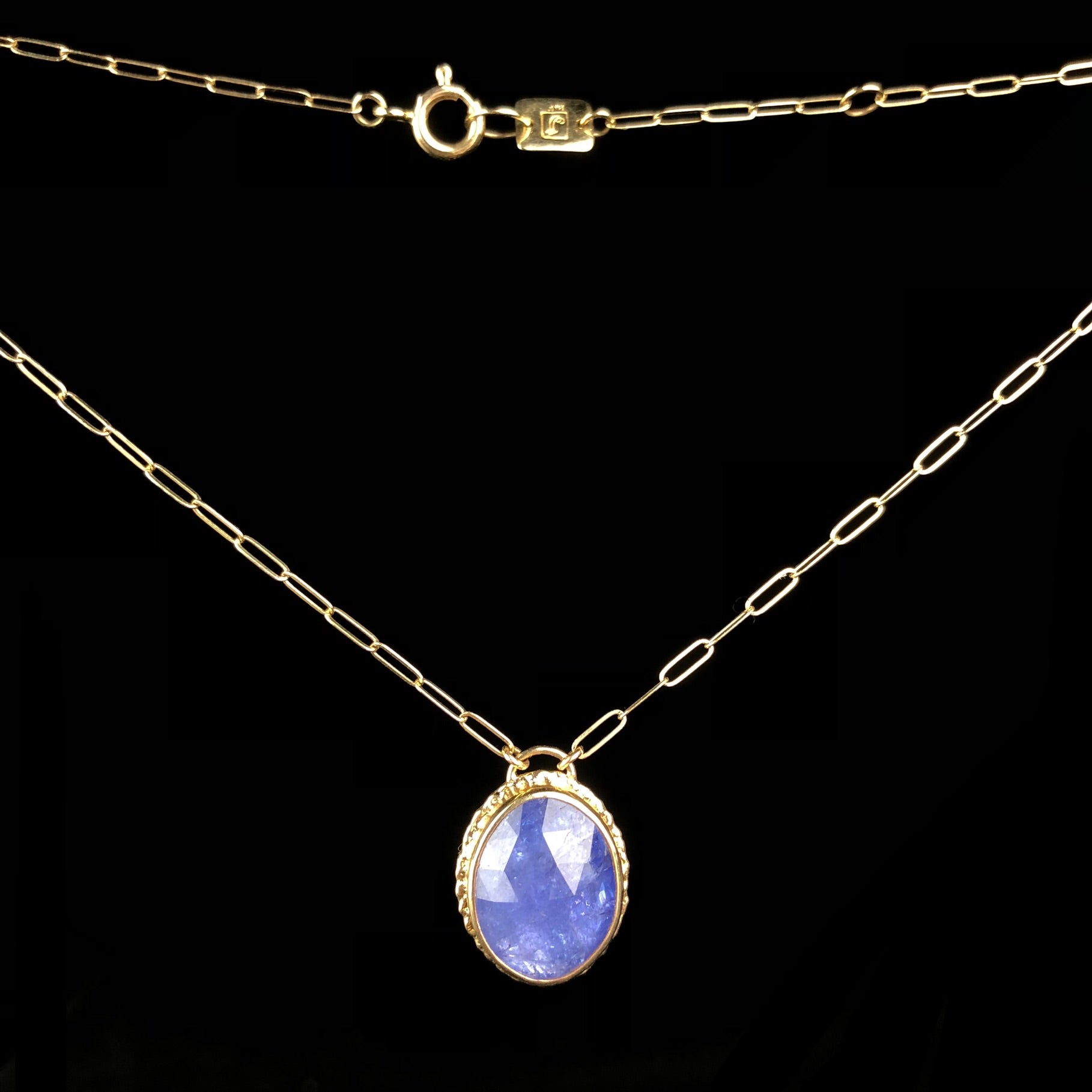 Front view of Tanzanite Necklace with faceted purple stone