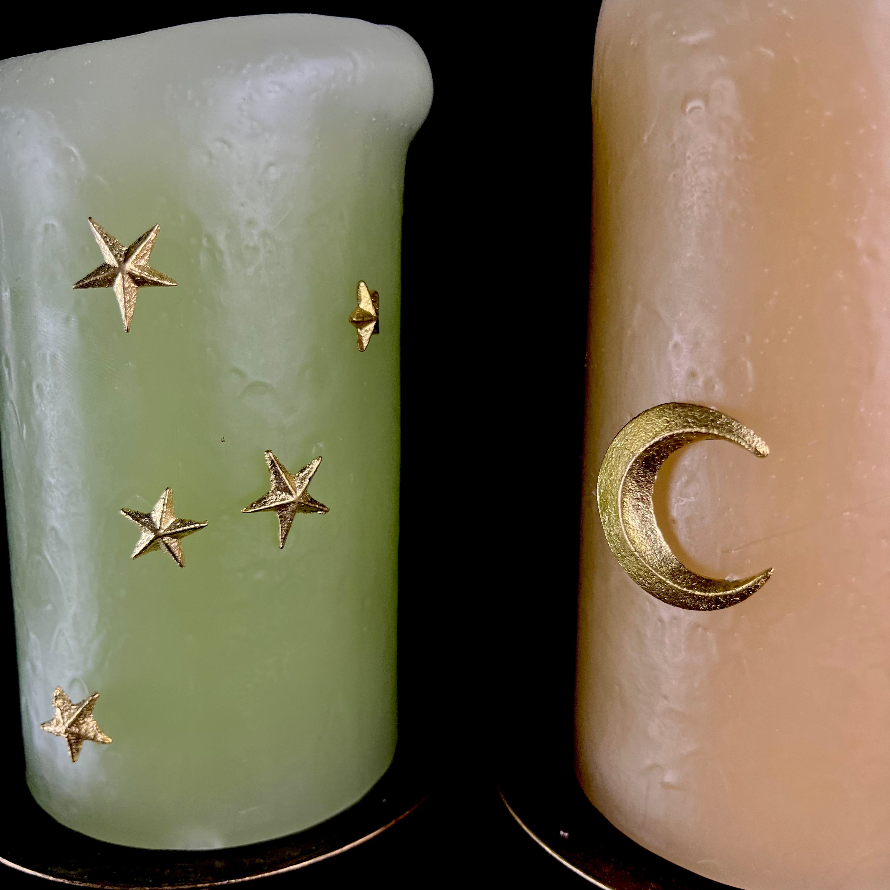 Star and Moon candle charms shown in candles